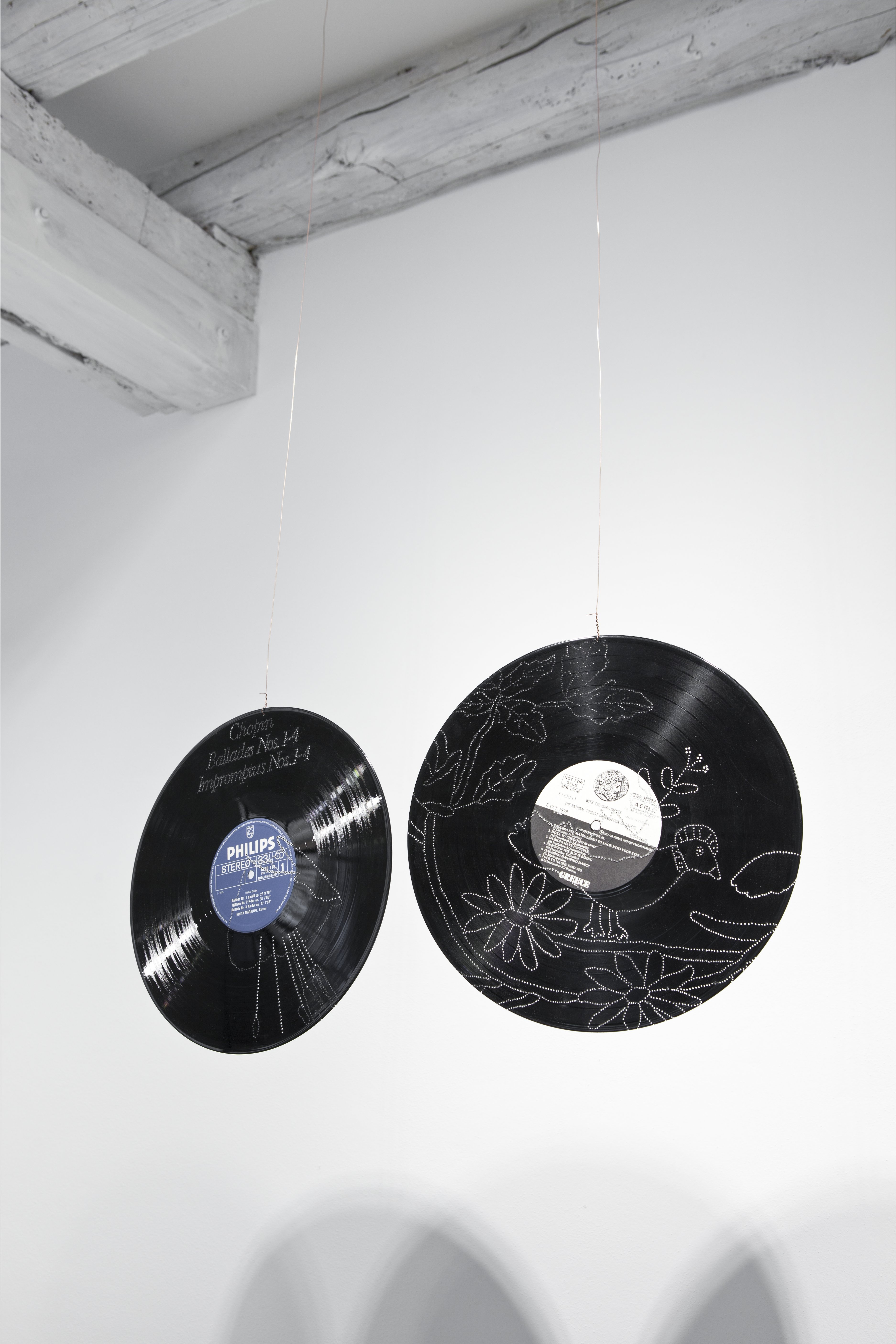 Installation view by Stefano Arienti, Dischi, 2013, perforated vinyl records
