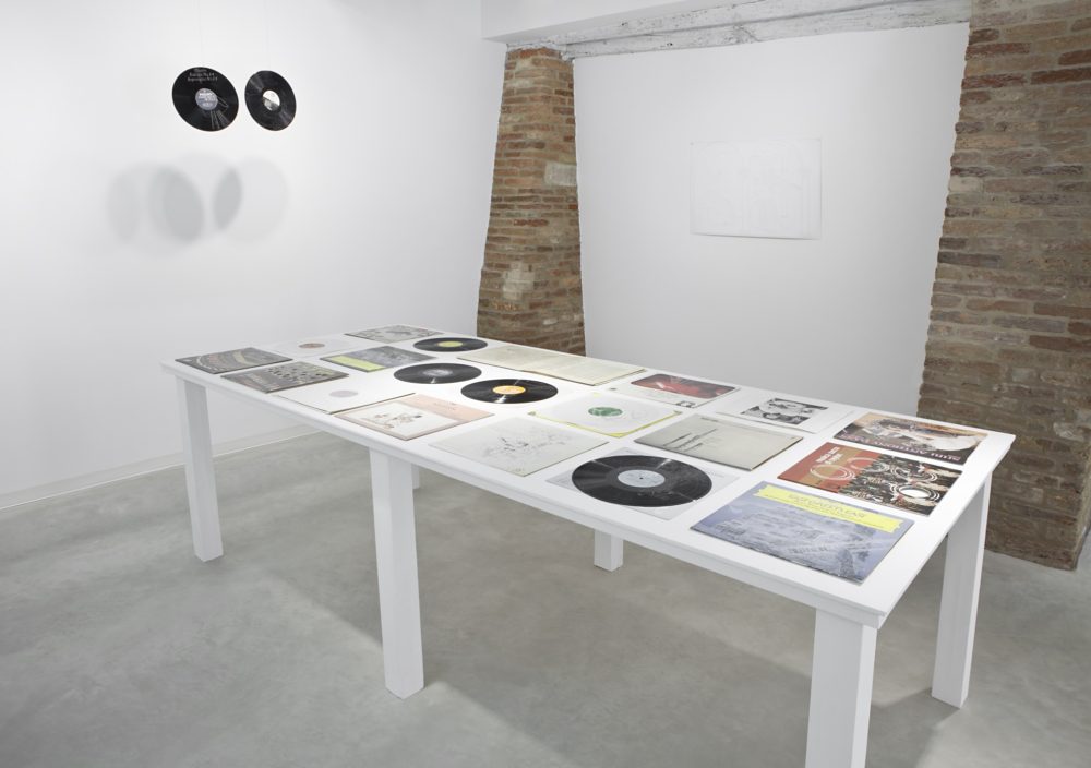 Installation view, Marignana Arte, Copertine, Stefano Arienti, Dischi, 2013, Perforated vinyl records