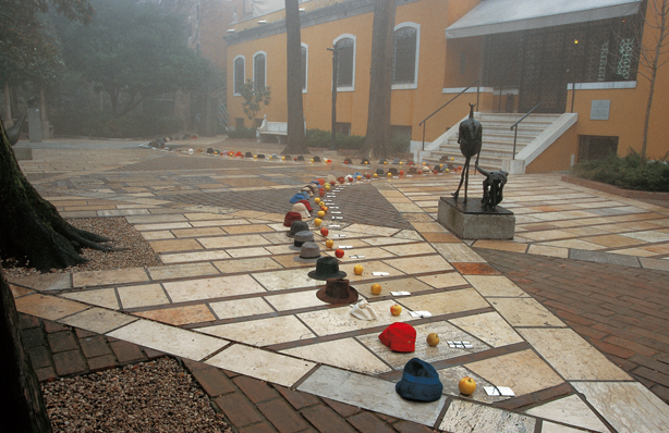 Installation view of Hats, apples and papers, 1999, site-specific installation, Peggy Guggenheim Collection, Venice